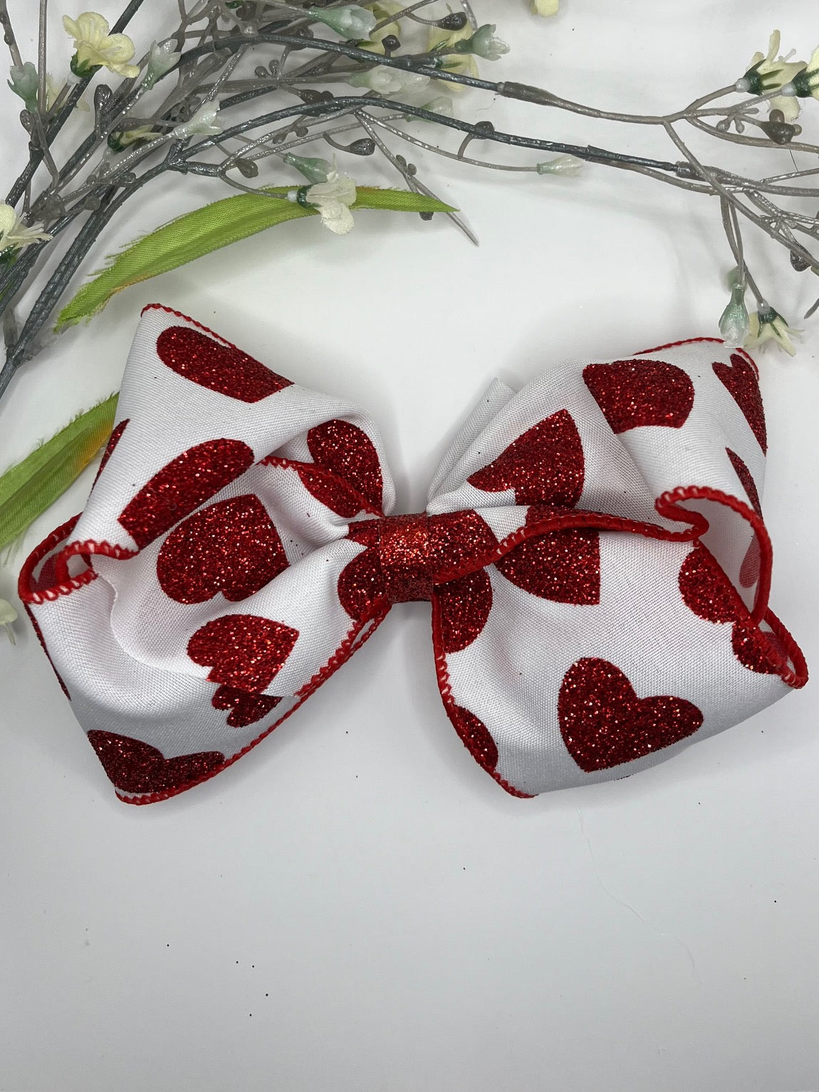 Sparkle heart print twisted boutique bow
