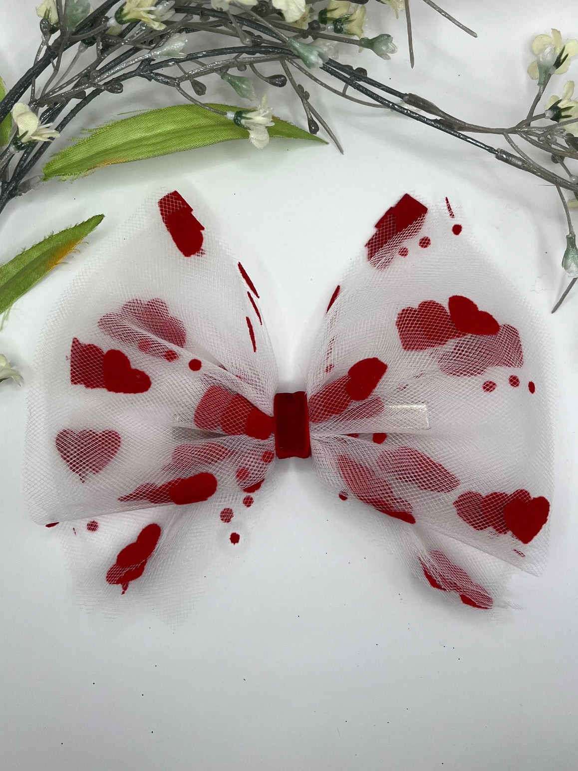 Red and white heart flock printed tulle clip in hair bow