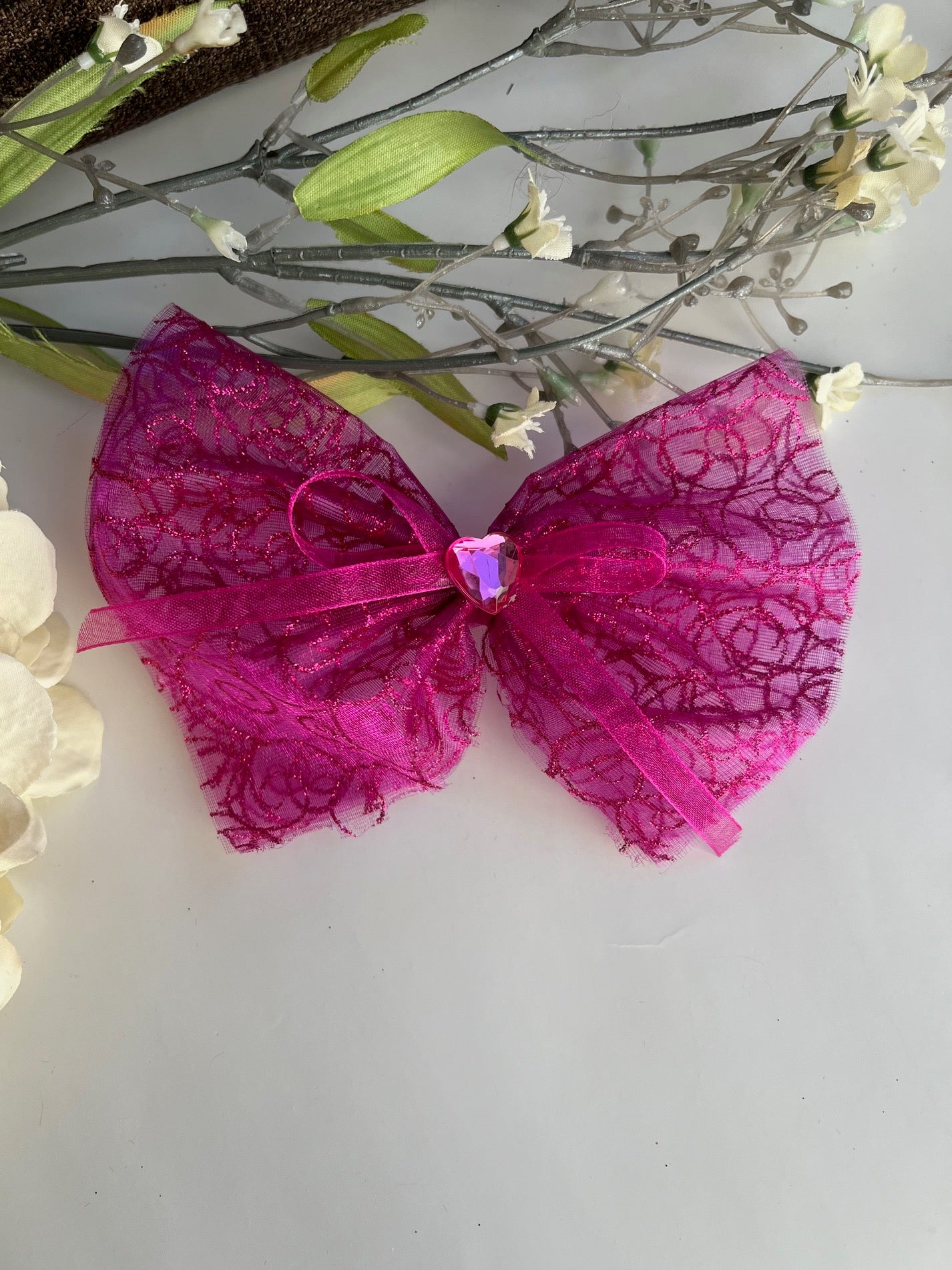 Magenta glitter organza bow with center bow and heart center décor clip in hair bow