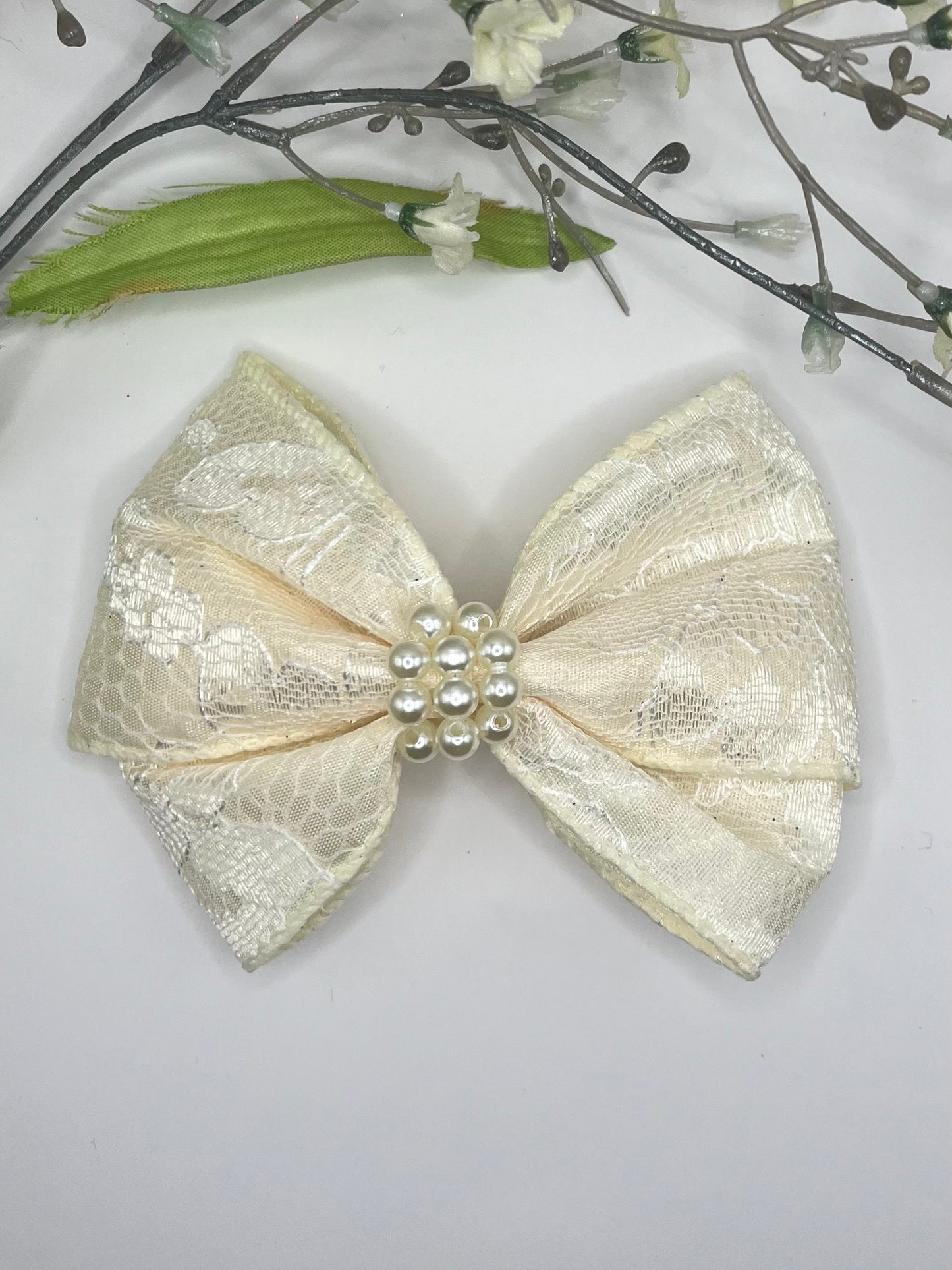 Ivory satin lace with pearl center butterfly pinch clip in hair bow