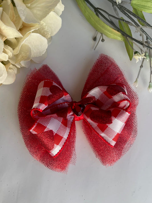 Heart checkered print bow over red sparkle tulle clip in hair bow