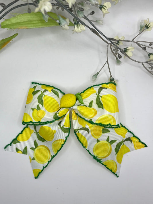 Lemon print pinch center tail clip in hair bow