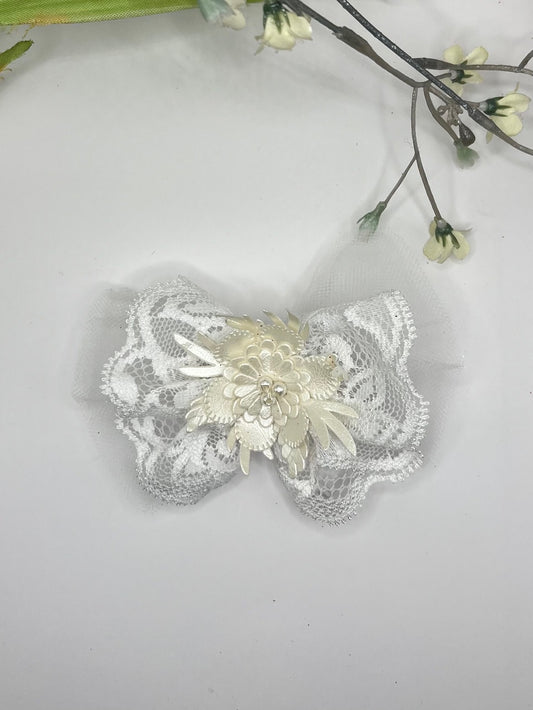 White lace over tulle with faux leather floral pearl center clip in hair bow