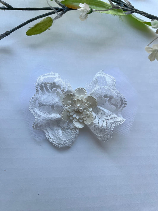 White lace over tulle with faux leather floral pearl center clip in hair bow